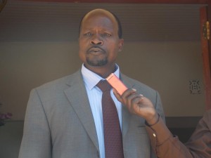Migori Governor Okoth Obado addressing a function at his office in Migori town yesterday. He said he wont meet MPs in Nairobi..