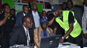 NASA presidential candidate Raila Odinga and Nairobi governor Evans Kidero check voters status recently